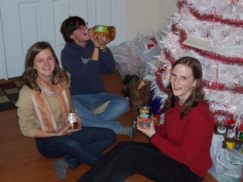 Showing off their food donations....don't forget to bring yours!